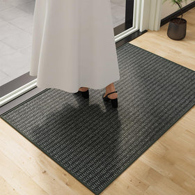 QQL Indoor Doormat 24x40 at entrance, stylish black and grey design with dirt trapping.