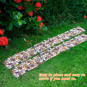 Qualdout river rocks in natural color tones used for decorative yard accents and borders