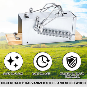 Qualirey squirrel trap installation in yard highlights sturdy frame for reliable placement.