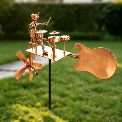 Quanqiuyi metal drummer windmill with drum set enhances garden ambiance for outdoor entertaining.