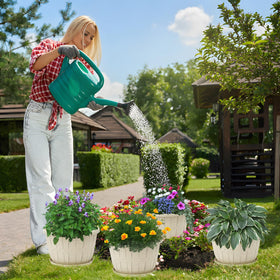 Quarut weather-resistant lightweight plastic planter suitable for year-round use.