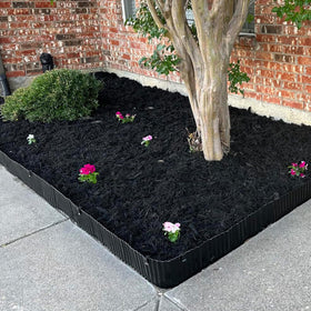 Quibbay edging helps deter weeds and guide pathways.