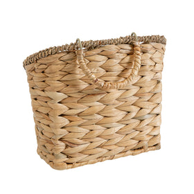 Quincry earthy-toned wall basket enhancing rustic decor and storage.