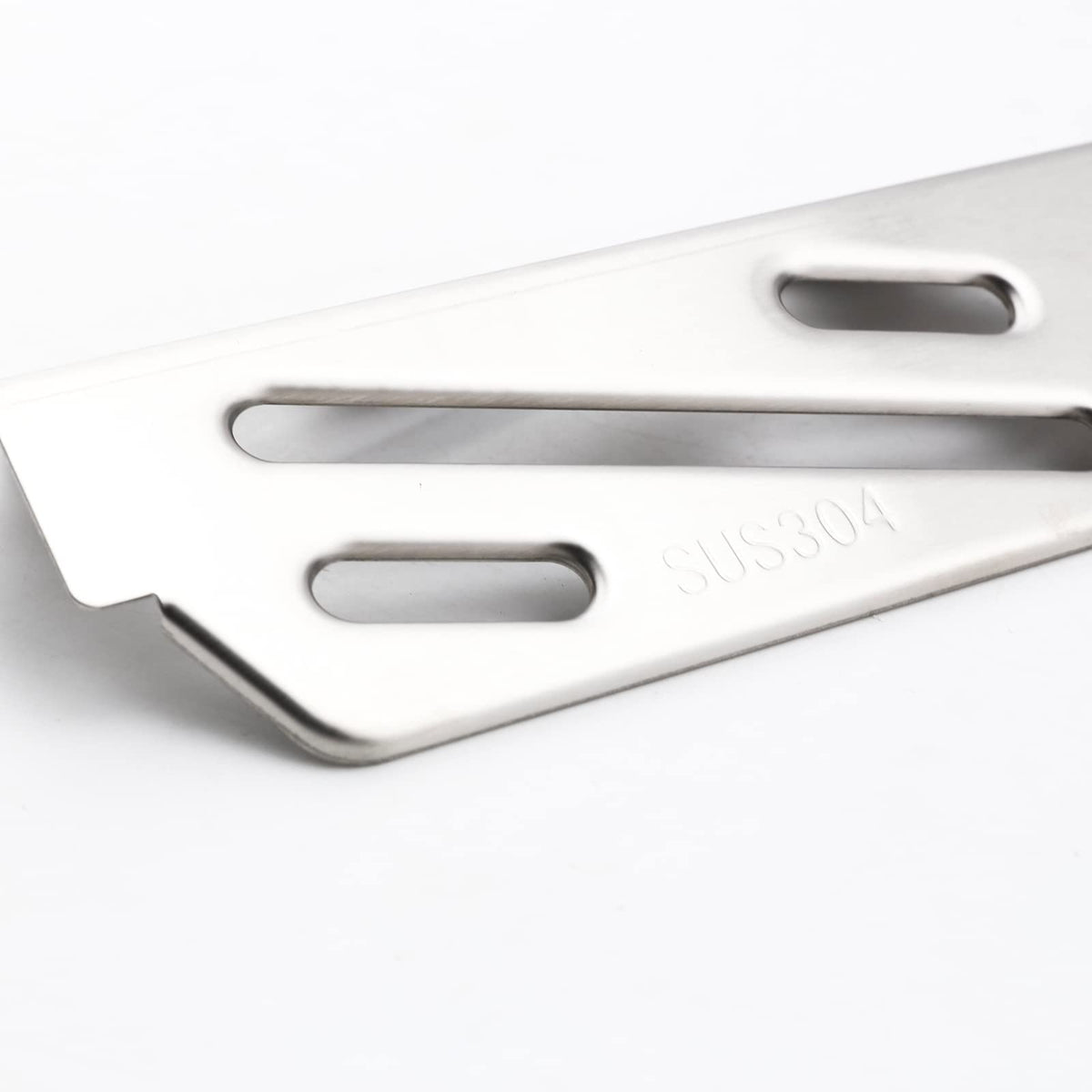 Installation view of QuliMetal heat deflector for Genesis II grills demonstrates quick swap