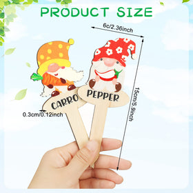 Qunclay gnome marker with fruit labels to identify harvest-ready plants