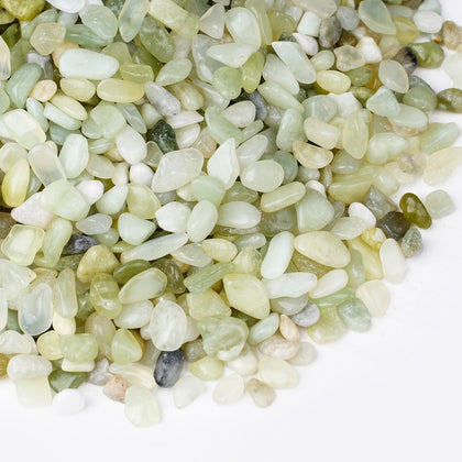 Rahato jade pebbles in a vase add drainage and decor for indoor plants.