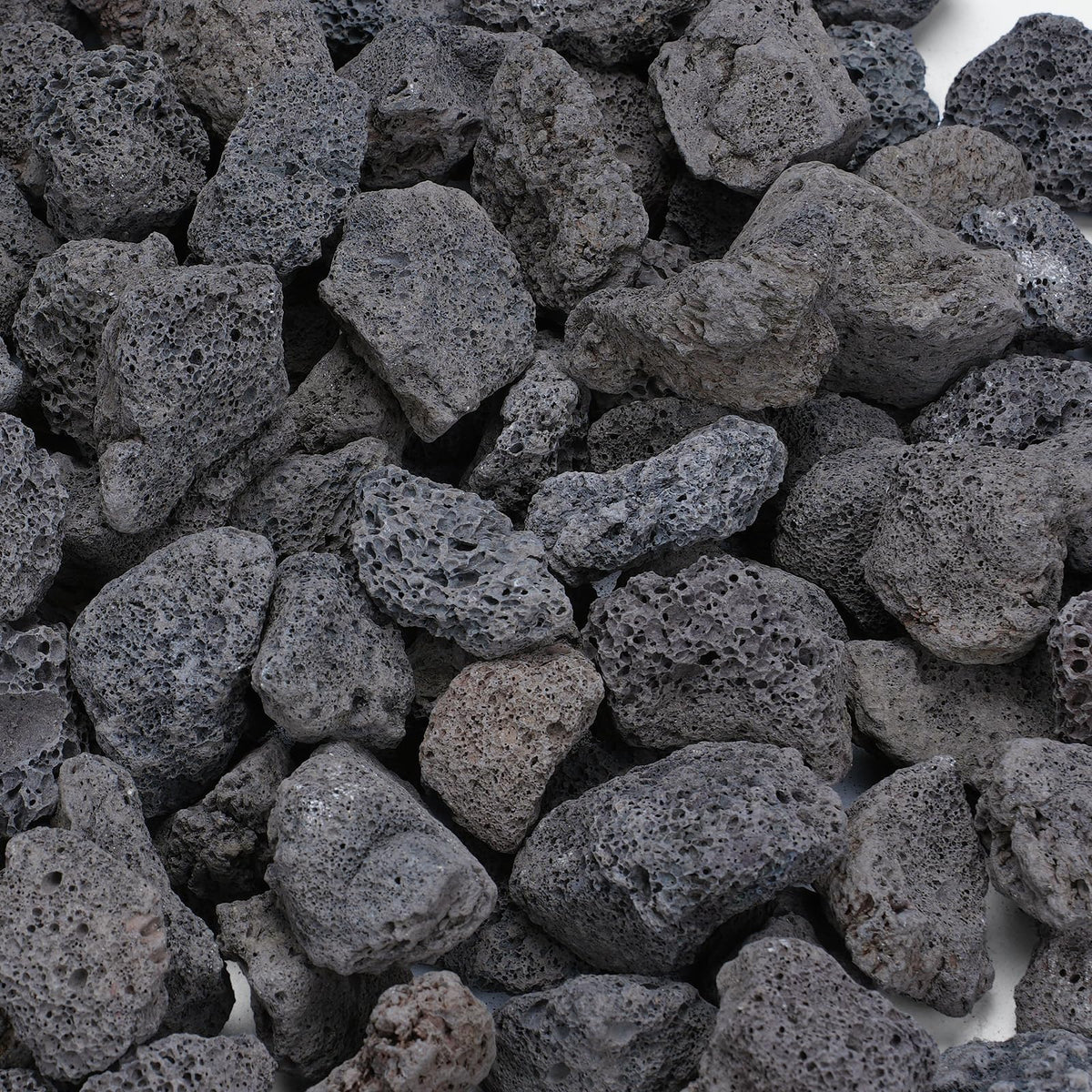 Rahato lava rocks 20lb bag for natural, even flame distribution in fire pits.