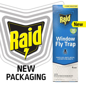 Raid transparent fly trap closeup shows clear adhesive surface catching insects