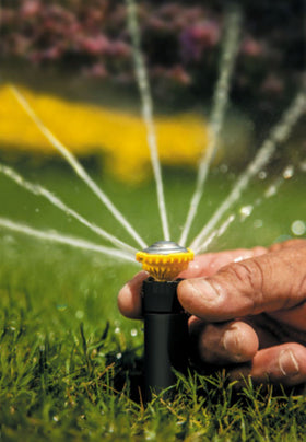 Rain Bird debris flush nozzle lets you clear clogs during operation.