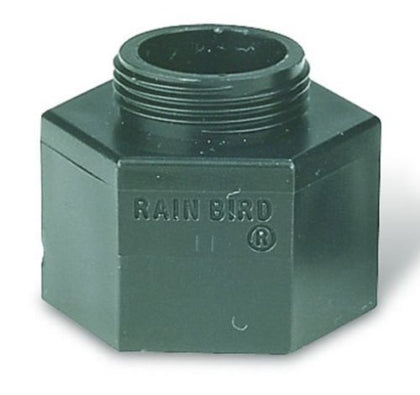 Rain Bird shrub adapter enables nozzle-to-riser connections for efficient shrub bed irrigation.