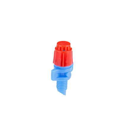 Raindrip 360JET010B micro spray jet demonstrating a full-circle watering pattern for beds