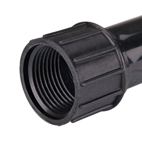 Raindrip green compression ring indicates 1/2 inch tubing compatibility for a secure seal