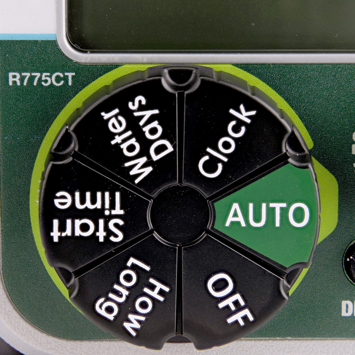 Raindrip timer mounted on a garden faucet enables hands-free irrigation