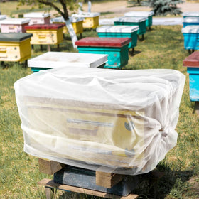 Ranjaner bee transport bag in use safely relocating a hive.