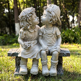 Rbhonb First Kiss statue: adorable couple for charming outdoor display.