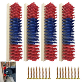 Rdiegtzno goat scratching brush red mounted in a barn for grooming and enrichment.