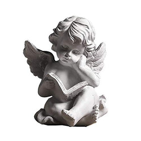 RealIdeas Reading Book Angel Statue on a shelf creates a calming home accent.