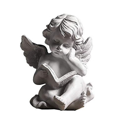RealIdeas Reading Book Angel Statue on a shelf creates a calming home accent.