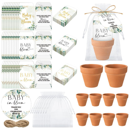 Reallnaive baby shower favors with terracotta pots; guests can plant later.