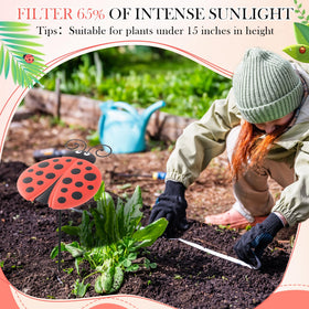Reallnaive Ladybug plant umbrella in-soil demonstrates easy setup and wind tolerance