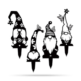 RealSteel outdoor gnomes as cheerful yard decor beside flower bed.