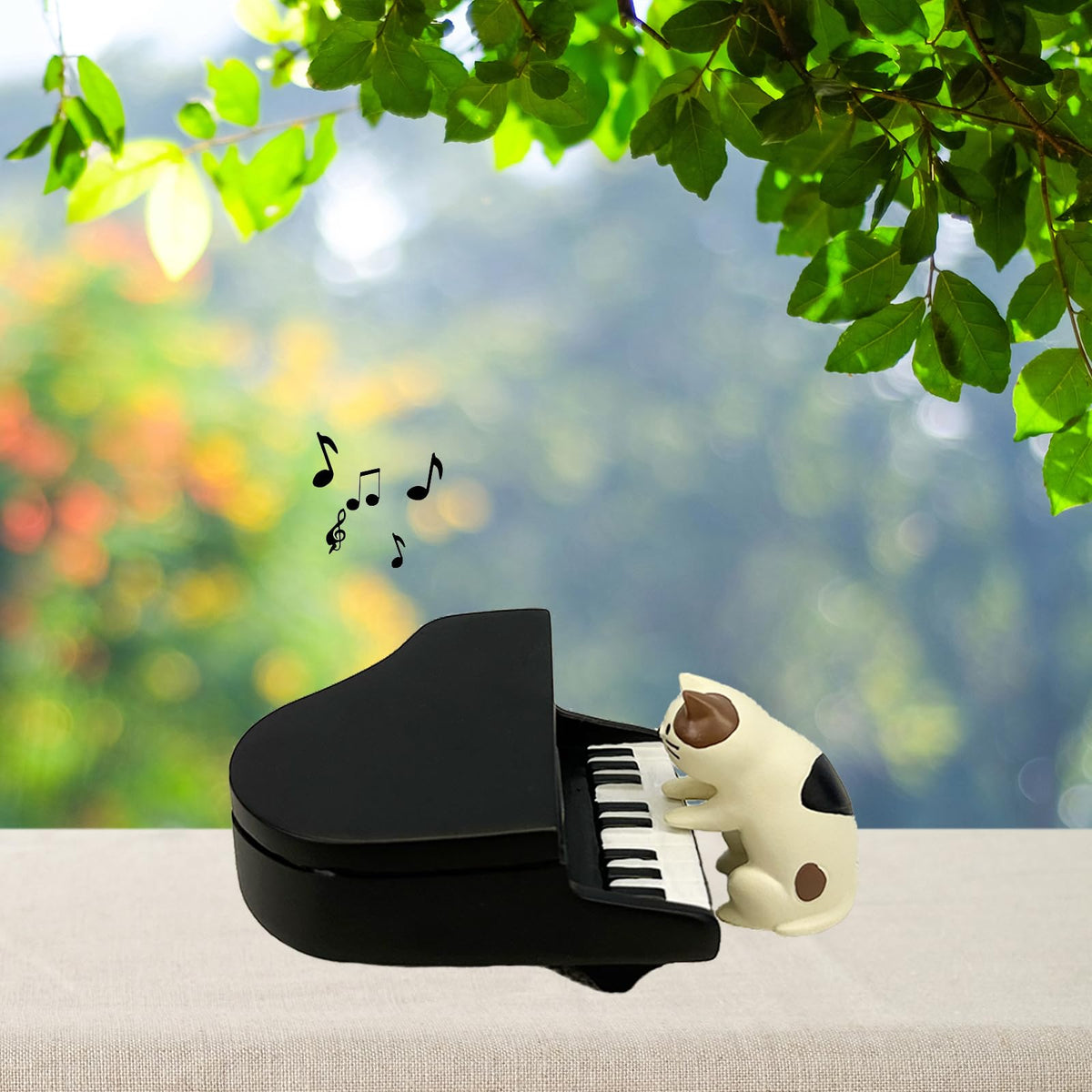 Refintural fairy garden cat piano scene creates enchanting plant shelf accents