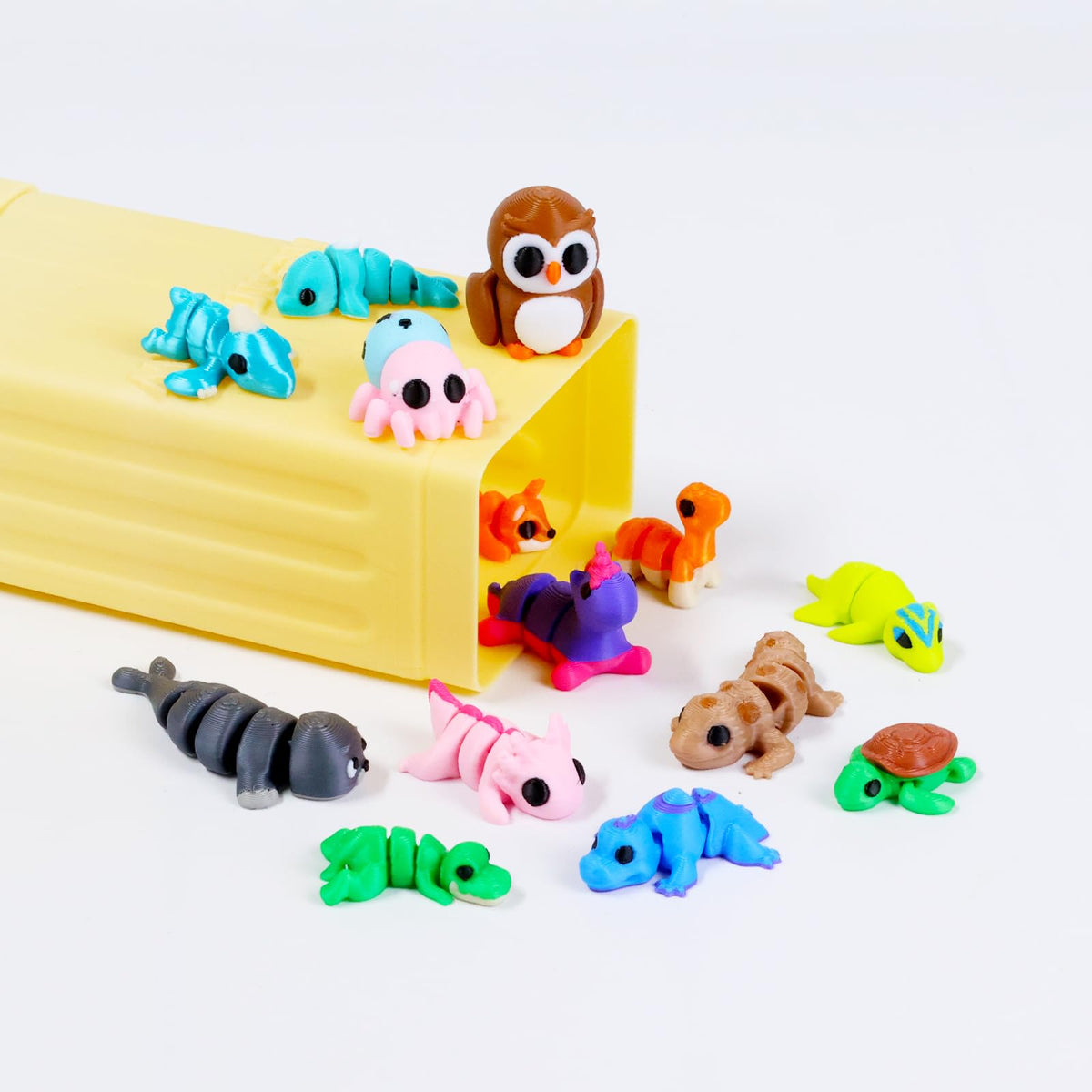 ResinGlow desk decor mini animals shown atop a workspace for whimsy and focus.