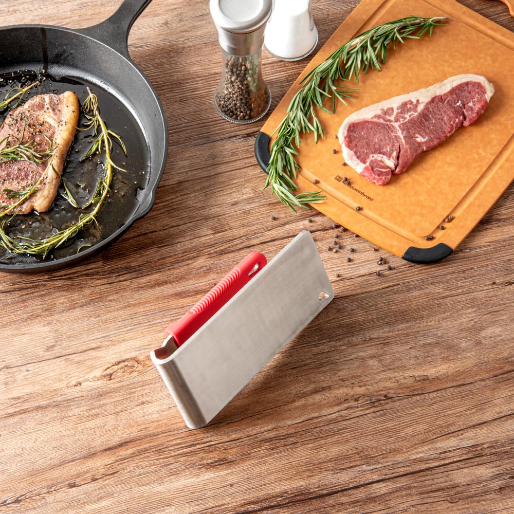 Restaurantware Met Lux steak press in use on grill delivering even sear.