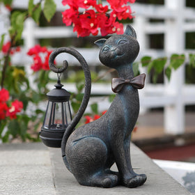 REYISO whimsical cat statue with solar light, front view for charming outdoor entry