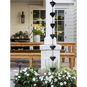 Rifachua 12-cup black rain chain creates a gentle water feature outdoors