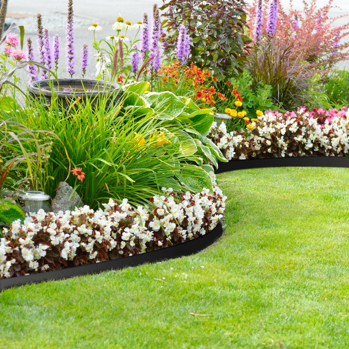 RLINGX rock-bed border creating tidy, durable lines