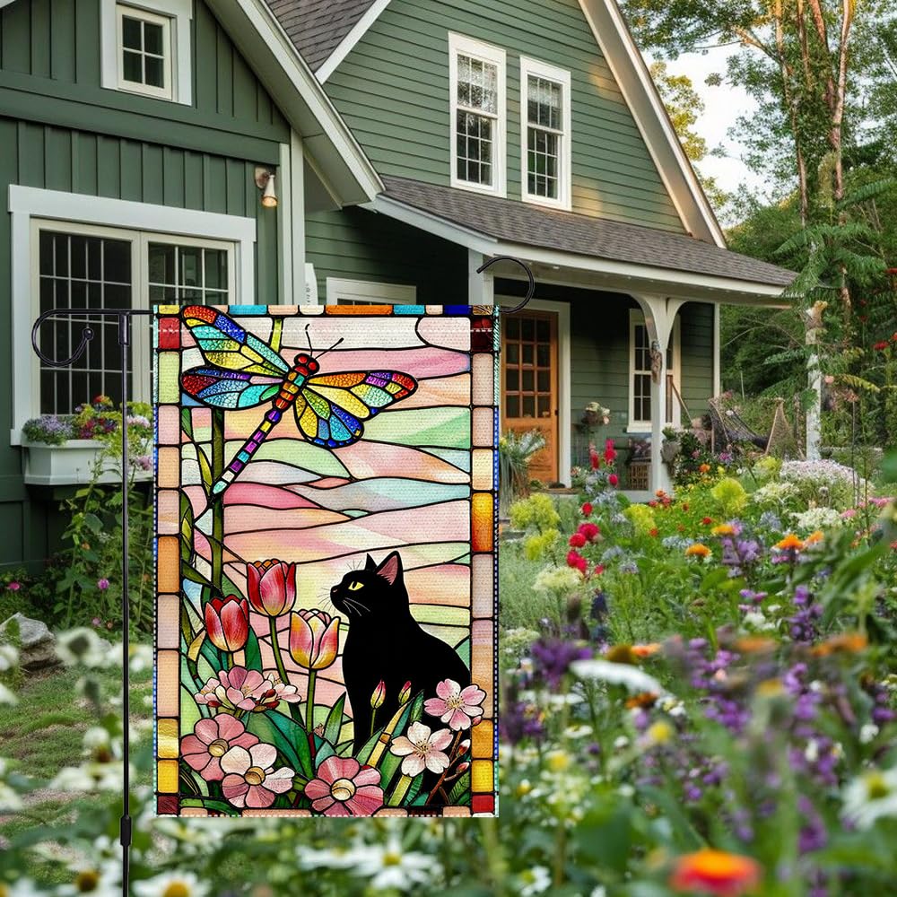 RMXJKIIU cat and butterfly motif greets guests at the yard entrance