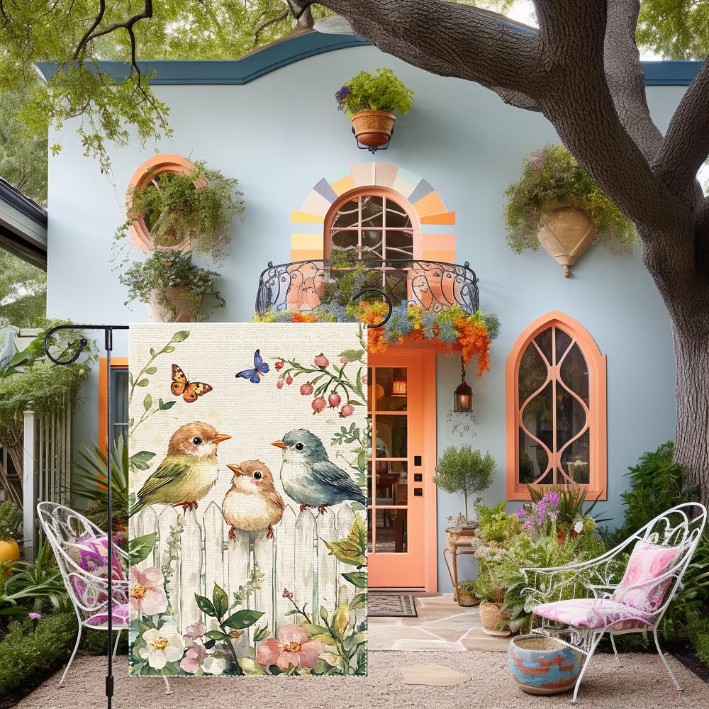 RMXJKIIU Flowers and butterflies on flag add seasonal outdoor color.