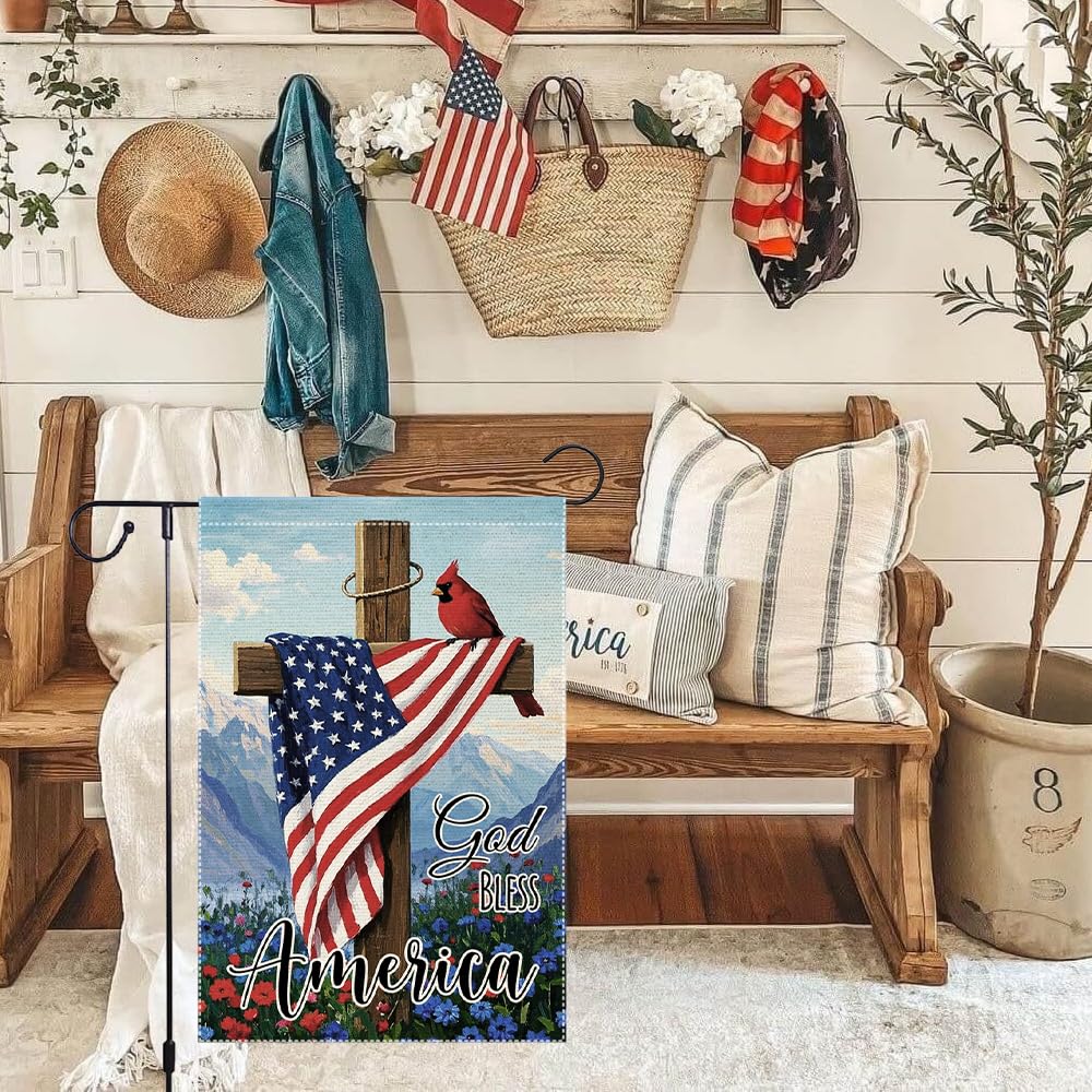 RMXJKIIU cardinal cross garden flag framed by wood and flowers.