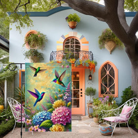RMXJKIIU Hummingbirds and blooming flowers flag highlighting vibrant colors for spring curb appeal.