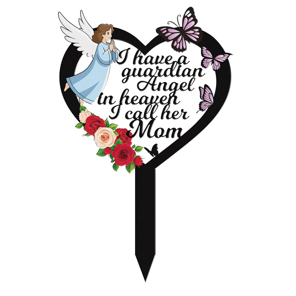 Rngmsi mom cemetery marker with angel and flower design honors a mother at gravesides.