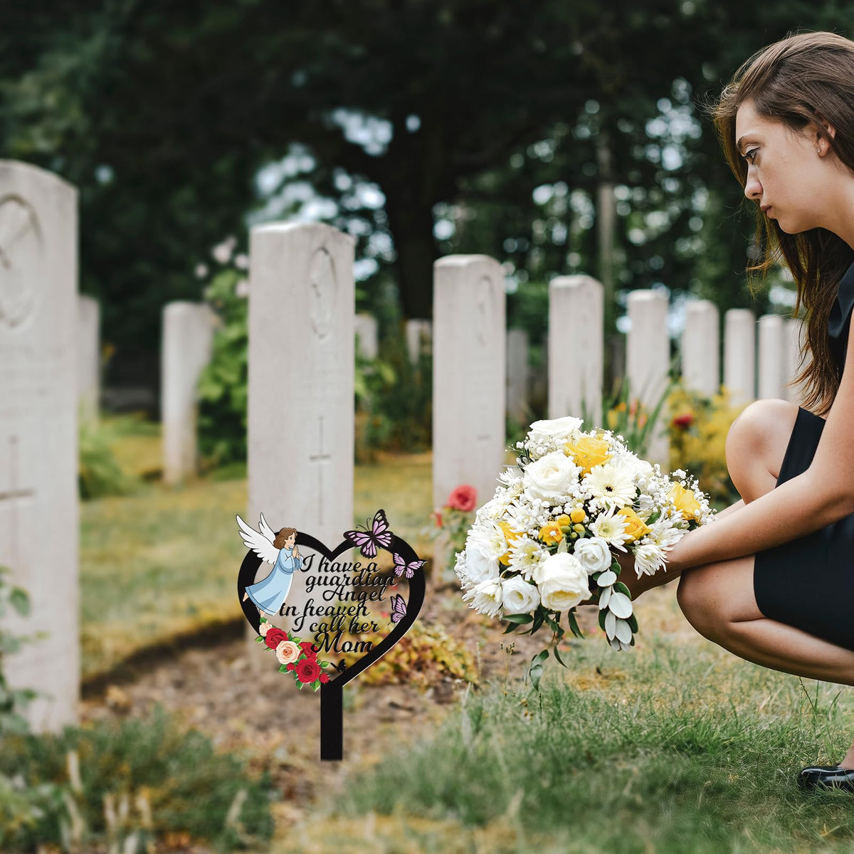 Rngmsi wrought-iron mom marker adds a dignified tribute at the grave.