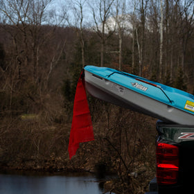 RoadPro 2424G red mesh flag detail showcasing durable grommets for quick mounting.
