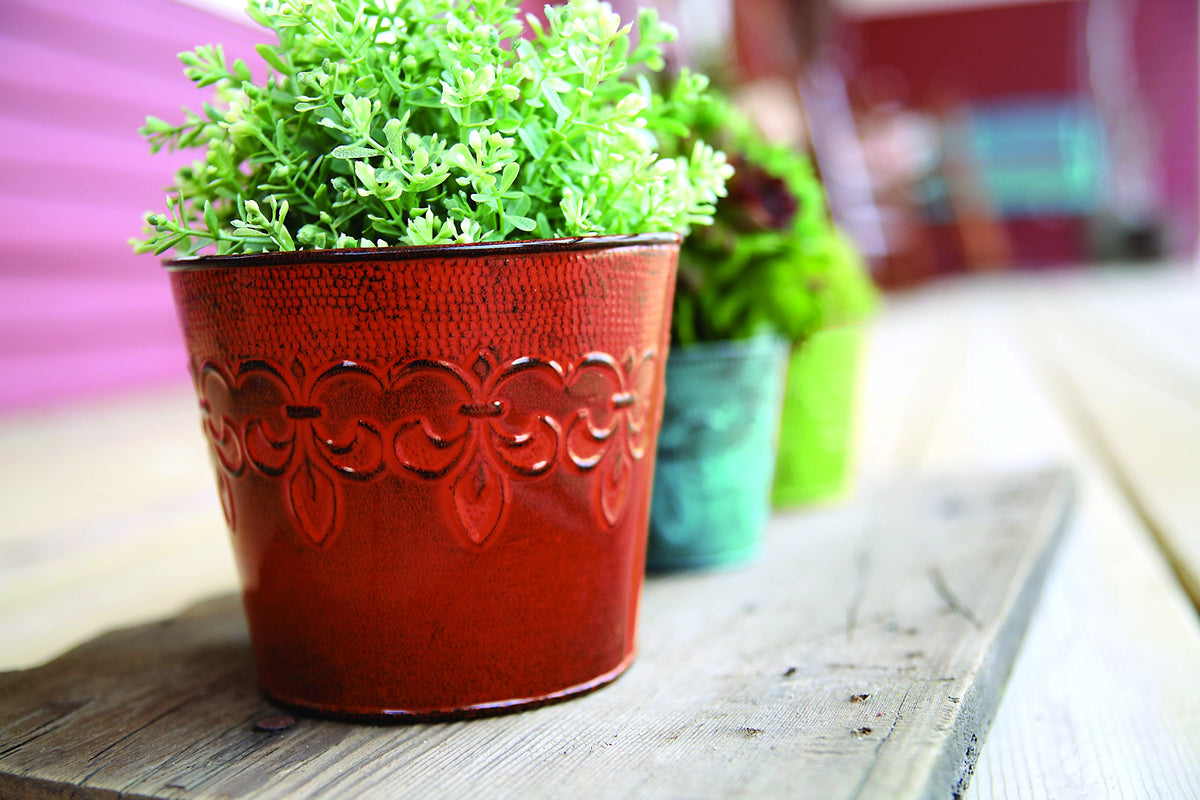 Robert Allen Fleur De Lis Cayenne Red planter top view with vibrant color and motif.
