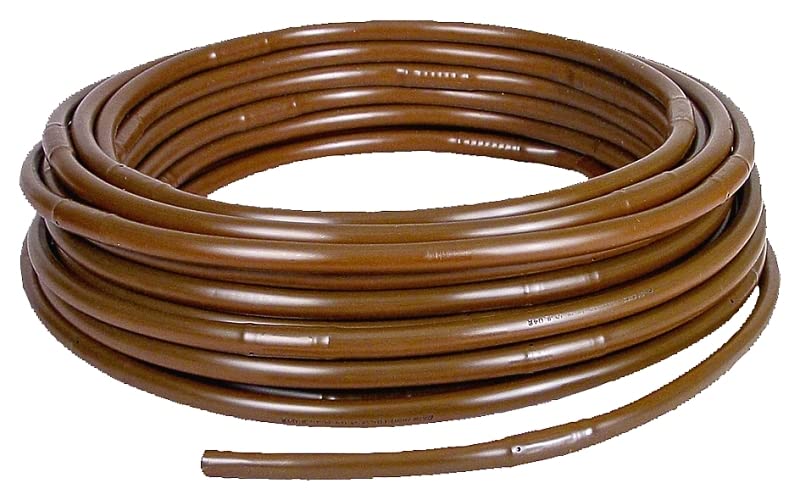 Rocky Mountain Goods drip hose emitters delivering precise root watering in action.