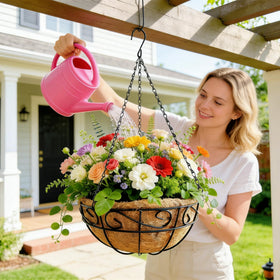 Outdoor garden display using rolanrosa baskets on porch.