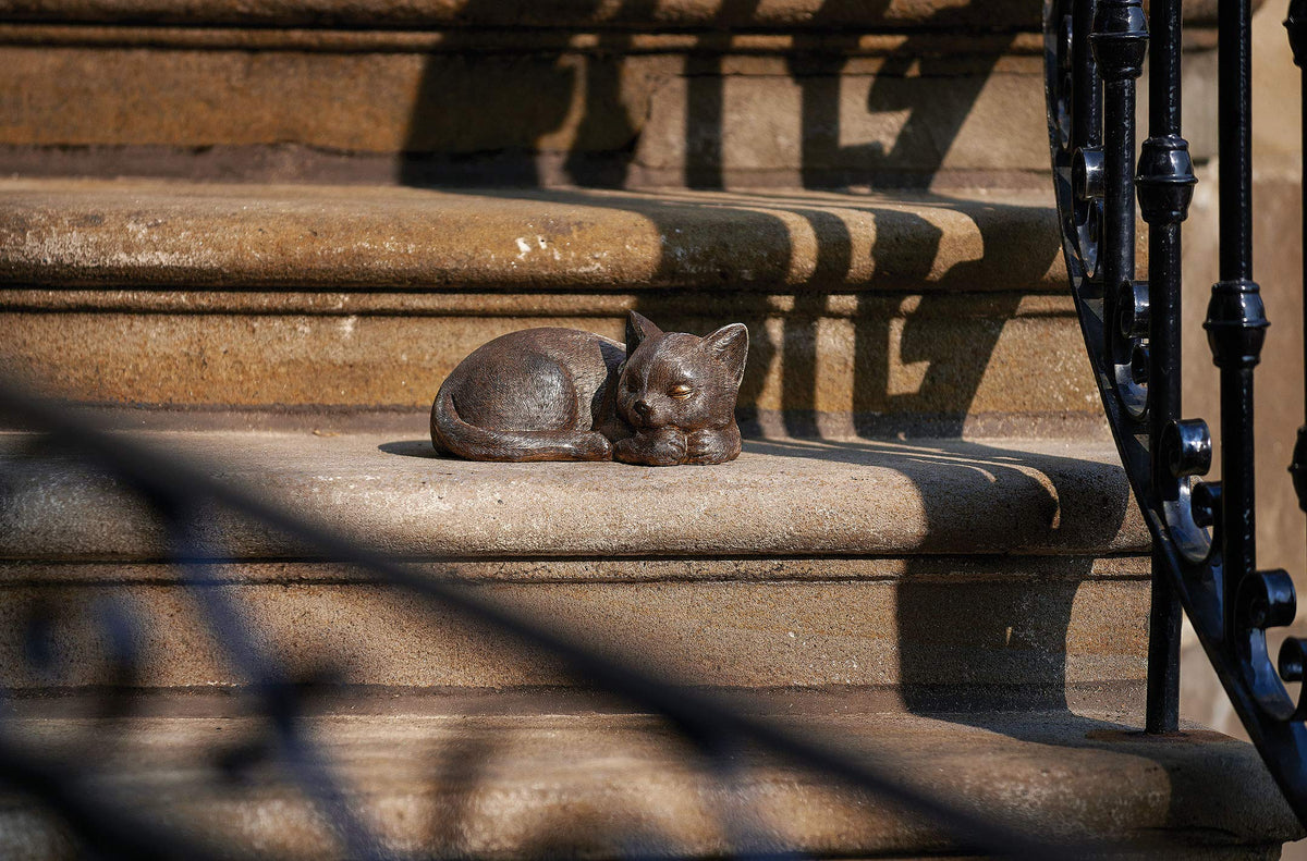 Roman Garden bronze sleeping cat statue, side view, durable resin stone for gardens.