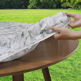 Romanstile waterproof material protecting table surfaces during spills