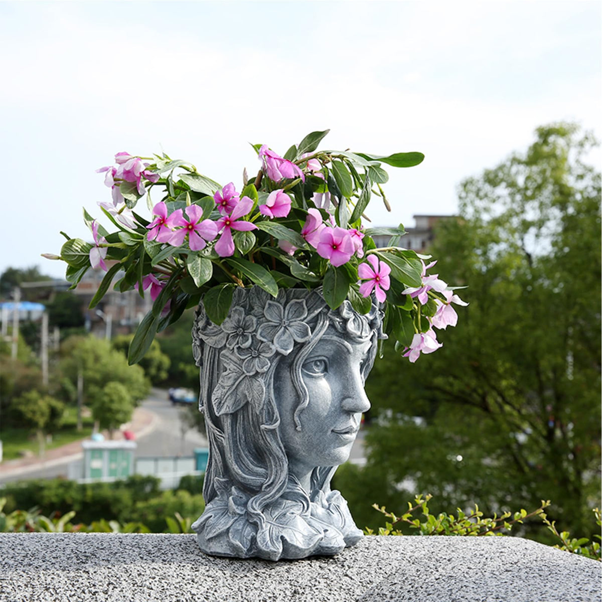 Romehaha face pot close-up reveals resin goddess design and smooth finish.