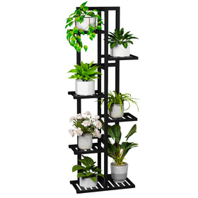 ROMGUAR CRAFT 6-tier bamboo plant stand displaying seven plants for space-saving elegance.