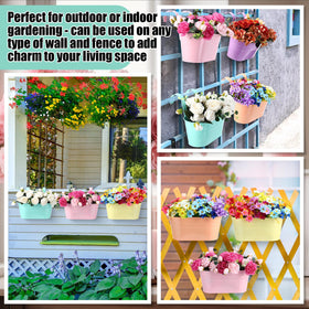 Romooa hanging planter in light green livens outdoor fence with blossoms
