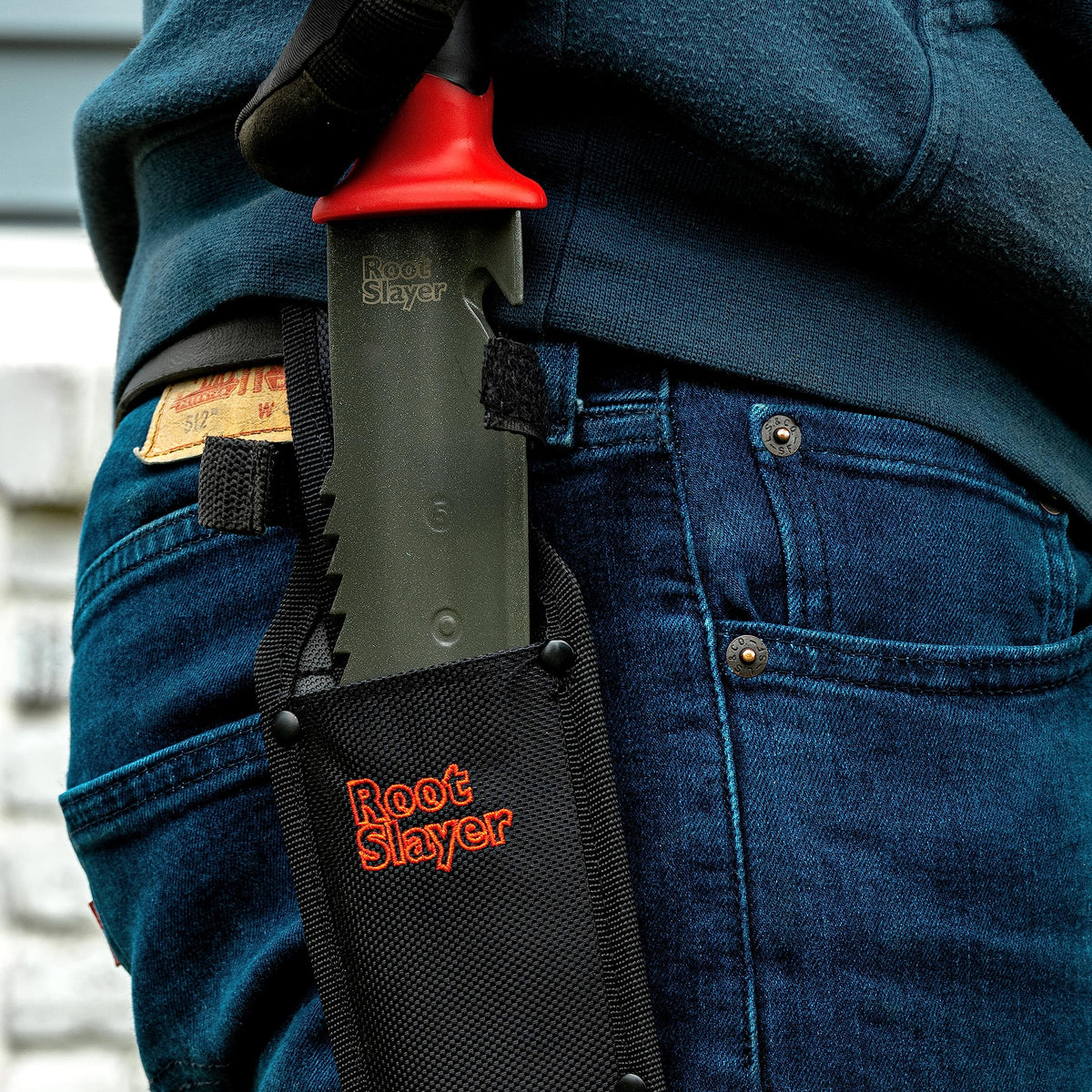 Root Slayer with holster attached for everyday garden maintenance