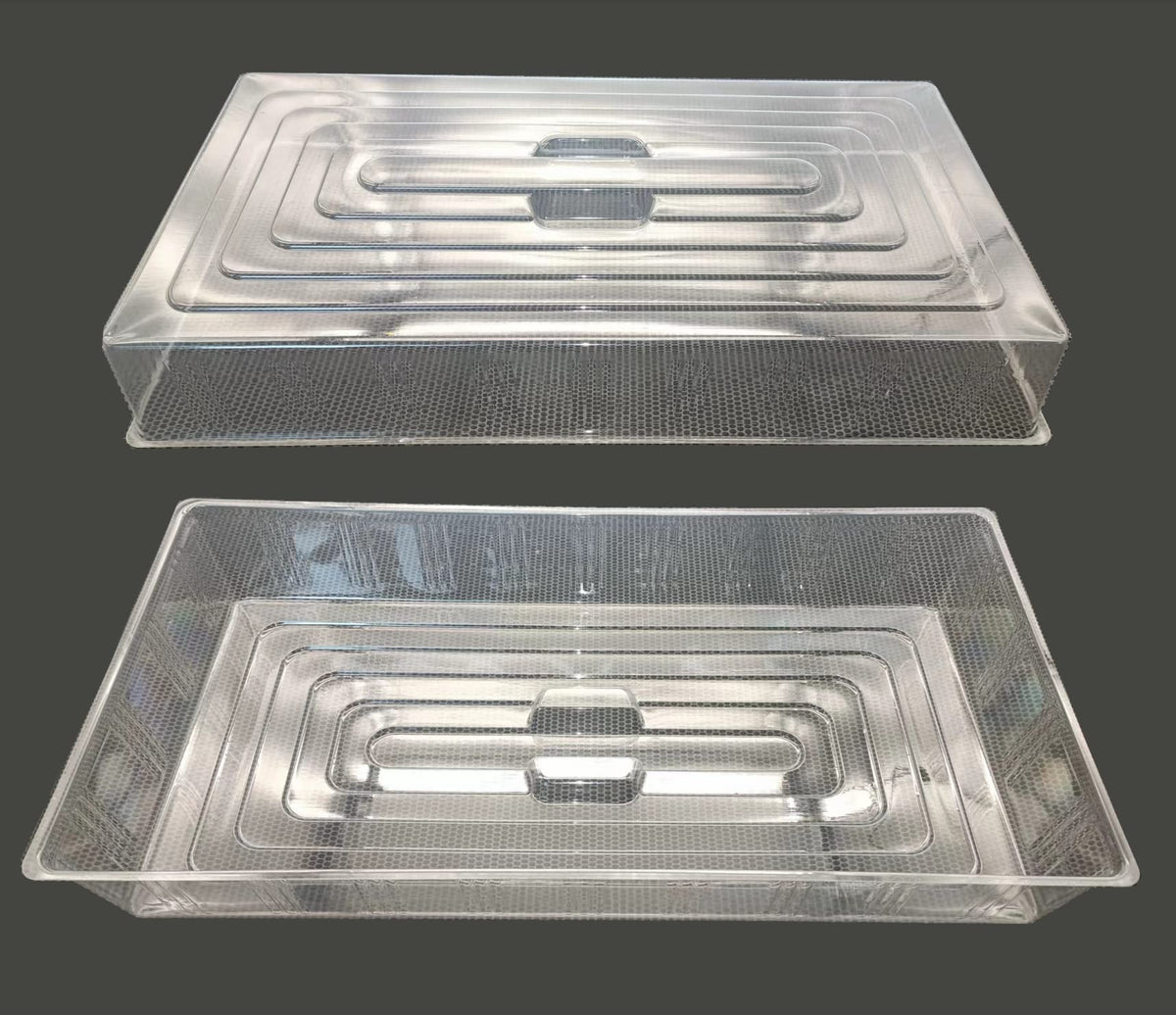 Clear RooTrimmer dome covering seed starter tray for a stable germination microclimate.