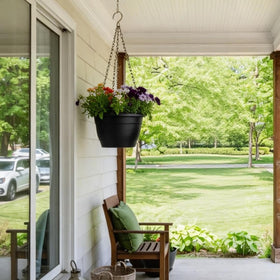 RooTrimmer hanging planter with drainage holes and removable plugs