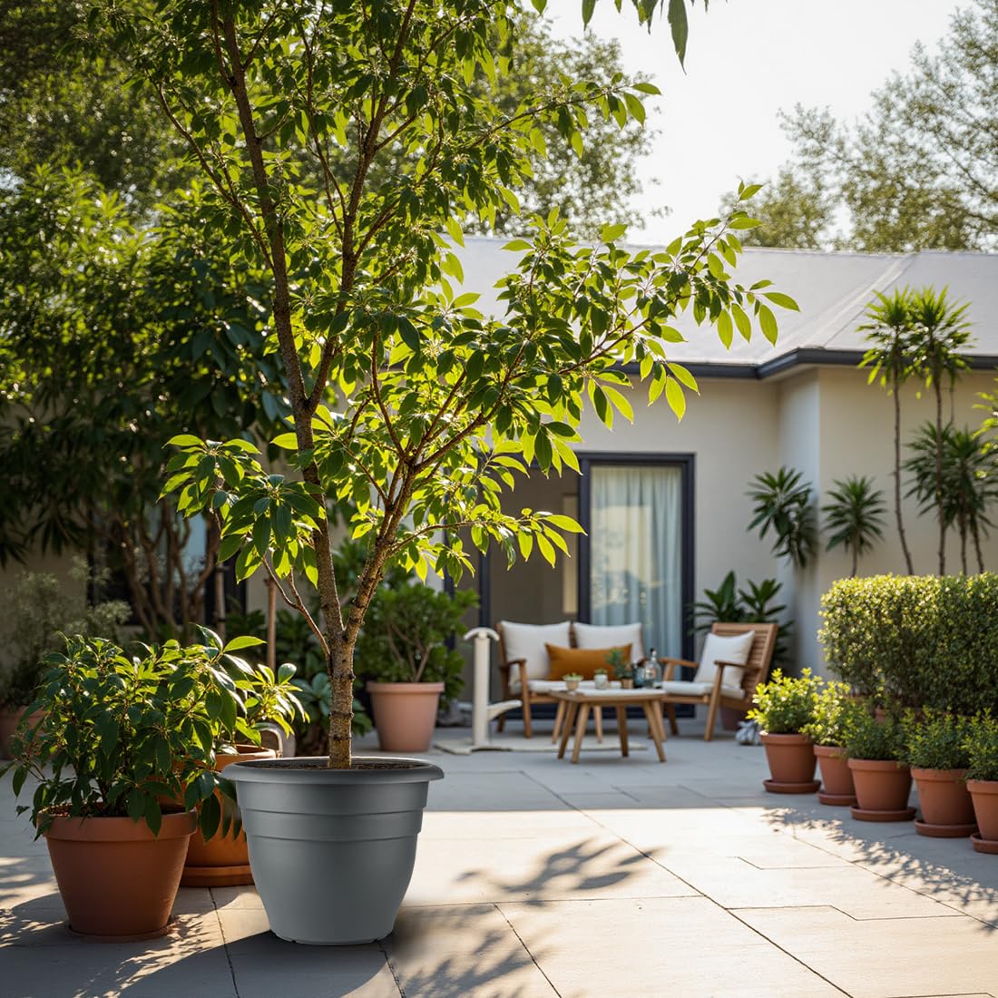 RooTrimmer 16-inch pots set enhances container gardening on porches and walkways.